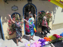 People dressed up in festive costumes for the Mardi Gras parade in Ajijic, Mexico.