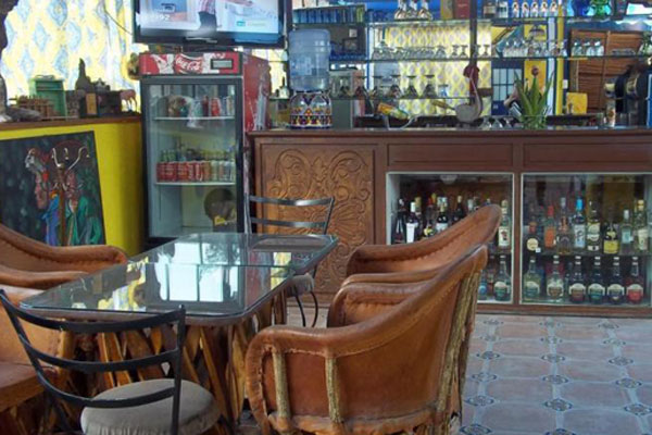 Roof top bar with table and chairs at Hotel la Estancia.