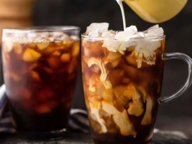 Two glass mugs filled with iced coffee at Cafe Grano Cafe, one of the favourite Ajijic Restaurants cafes.