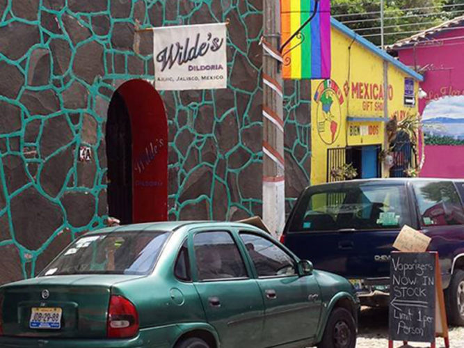 Street view of wilde's dildoria store with sign on will in ajijic, mexico